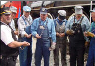 crew looking at pocket watches